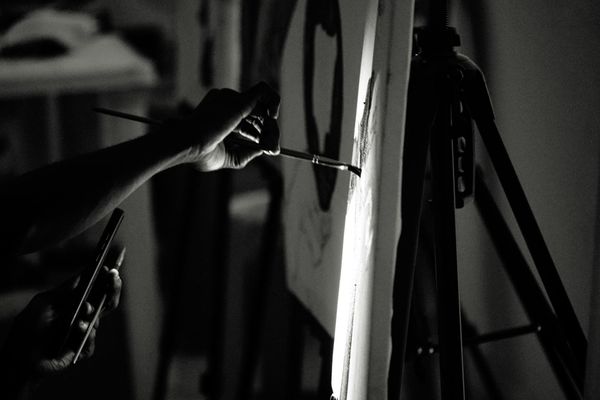 Close-up of hands in a calm, focused gesture.